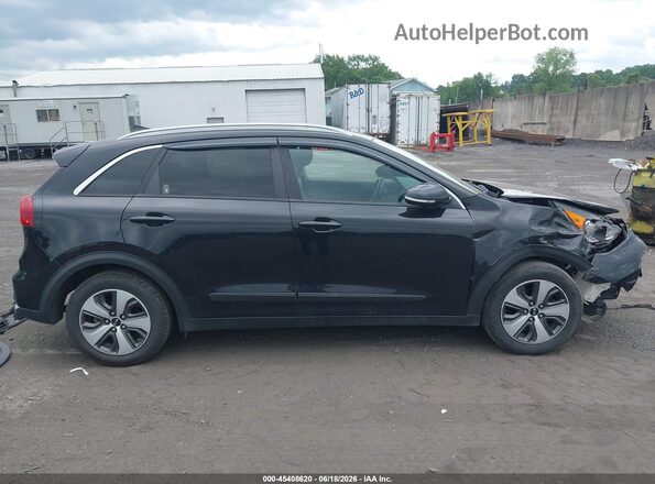 KNDCC3LCXH5036417 2017 KIA NIRO Black Rear interior view