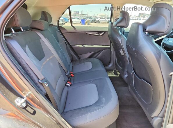 KNDCP3LE9T5329840 2026 KIA NIRO Gray Vista interior trasera