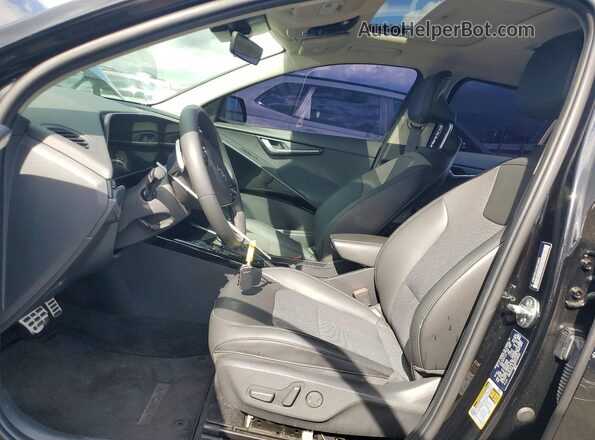 KNDCR3LE3S5218063 2025 KIA NIRO Black Front interior view