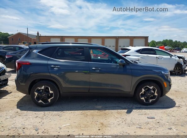 KNDER2AA9S7784834 2025 KIA SELTOS Gray Vista interior trasera