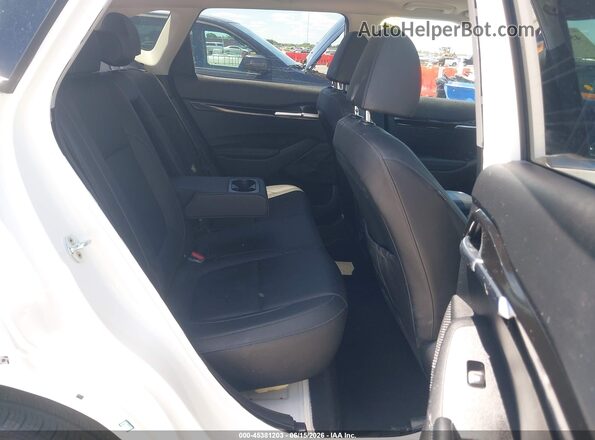 KNDERCAA8P7406792 2023 KIA SELTOS White Vista de la etiqueta del VIN