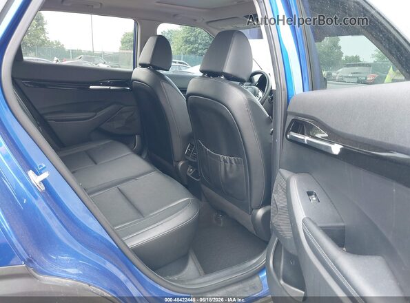 KNDERCAA9M7186171 2021 KIA SELTOS Blue Widok naklejki z numerem VIN