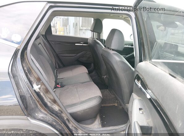 KNDEUCAA0M7140372 2021 KIA SELTOS Black Vista de la etiqueta del VIN