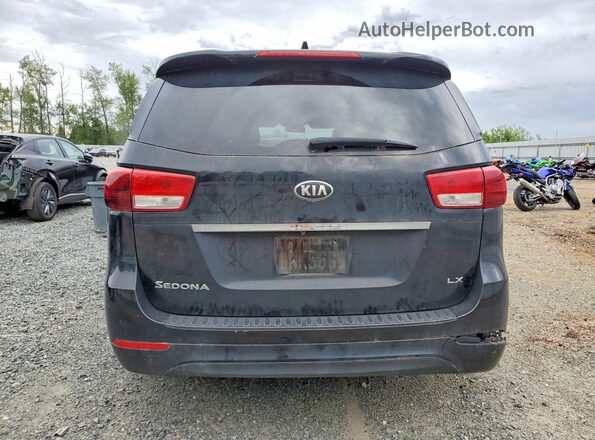KNDMB5C10H6225900 2017 KIA SEDONA Black უკანა ხედი