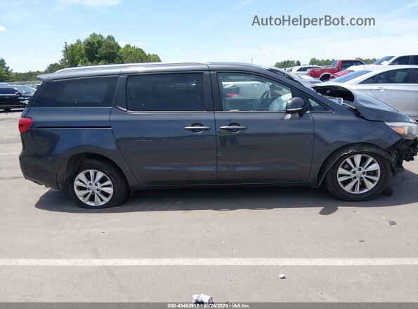 KNDMB5C10H6238923 2017 KIA SEDONA Blue Rear interior view