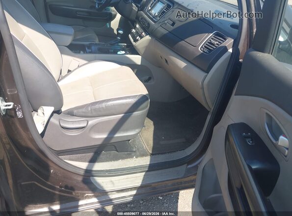 KNDMB5C10H6248173 2017 KIA SEDONA Gray Vista interior delantera