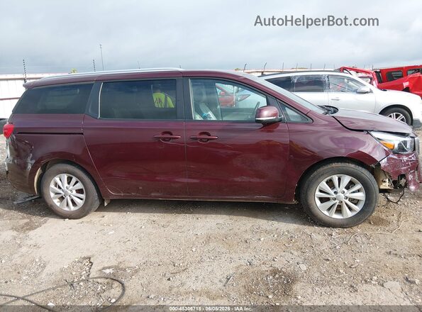 KNDMB5C11J6399934 2018 KIA SEDONA Burgundy Vista interior trasera