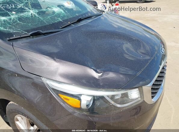 KNDMB5C12H6324721 2017 KIA SEDONA Brown Front view