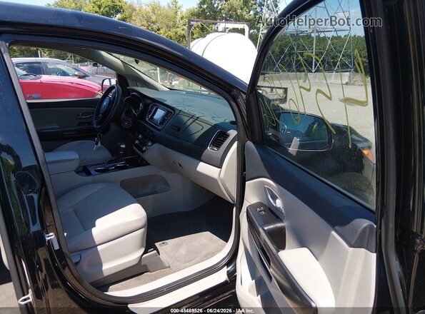 KNDMB5C12K6511089 2019 KIA SEDONA Черный Вид салона спереди