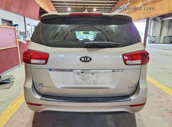 KNDMB5C13G6098414 2016 KIA SEDONA Beige უკანა ხედი