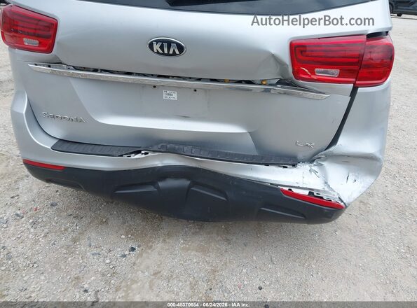 KNDMB5C13K6541279 2019 KIA SEDONA Серебряный Вид спереди