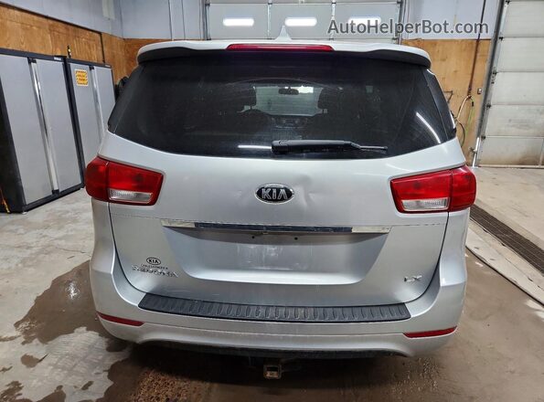 KNDMB5C14H6242411 2017 KIA SEDONA Серебряный Вид сзади