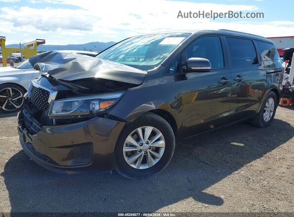 KNDMB5C14H6340094 2017 KIA SEDONA Brown Przód lewy