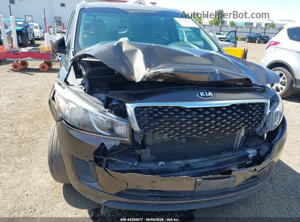 KNDMB5C14H6340094 2017 KIA SEDONA Brown Widok z przodu