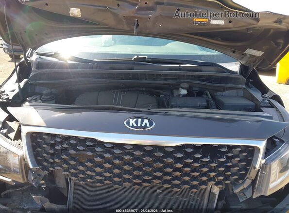 KNDMB5C14H6340094 2017 KIA SEDONA Brown Widok z tyłu