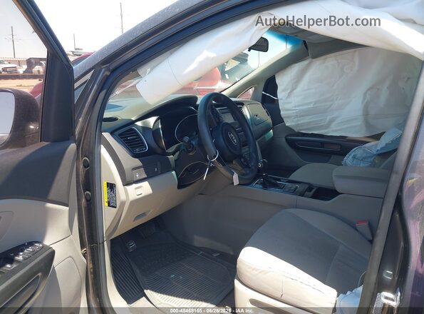 KNDMB5C15G6195372 2016 KIA SEDONA Gray Вид салону спереду