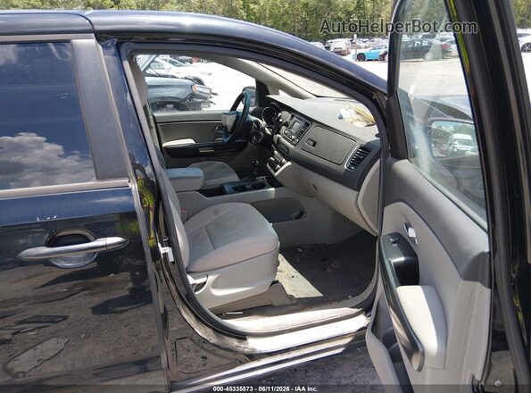 KNDMB5C16H6233838 2017 KIA SEDONA Black Front interior view