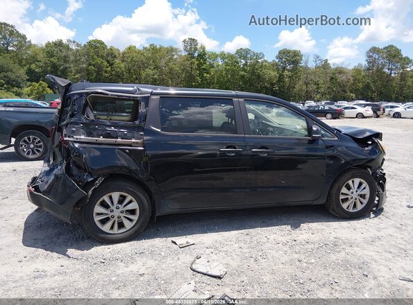 KNDMB5C16H6233838 2017 KIA SEDONA Black Rear interior view