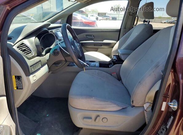 KNDMB5C17H6221679 2017 KIA SEDONA Burgundy Front interior view