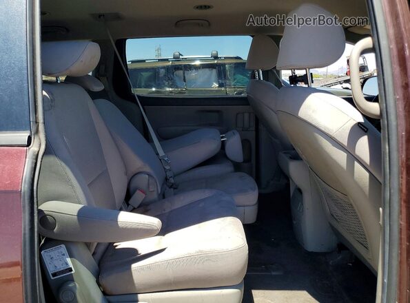 KNDMB5C17H6221679 2017 KIA SEDONA Burgundy Rear interior view