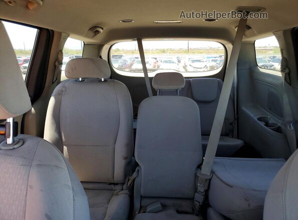 KNDMB5C17H6221679 2017 KIA SEDONA Burgundy Rear seats view