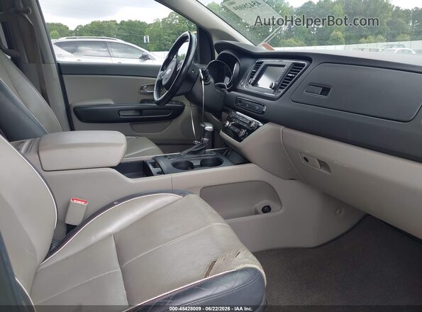 KNDMB5C17H6246081 2017 KIA SEDONA Silver Front interior view