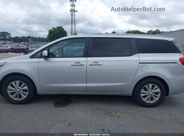 KNDMB5C17H6246081 2017 KIA SEDONA Silver 360 interior view