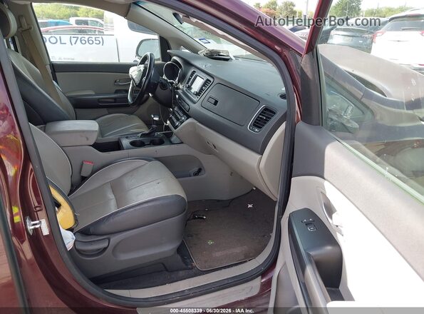 KNDMB5C17H6339523 2017 KIA SEDONA Maroon Vista interior delantera