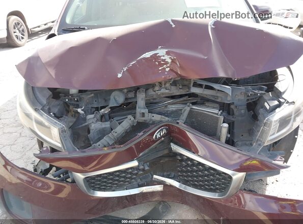 KNDMB5C17H6339523 2017 KIA SEDONA Maroon Vista frontal