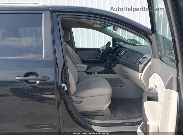 KNDMB5C18G6163273 2016 KIA SEDONA Black Front interior view