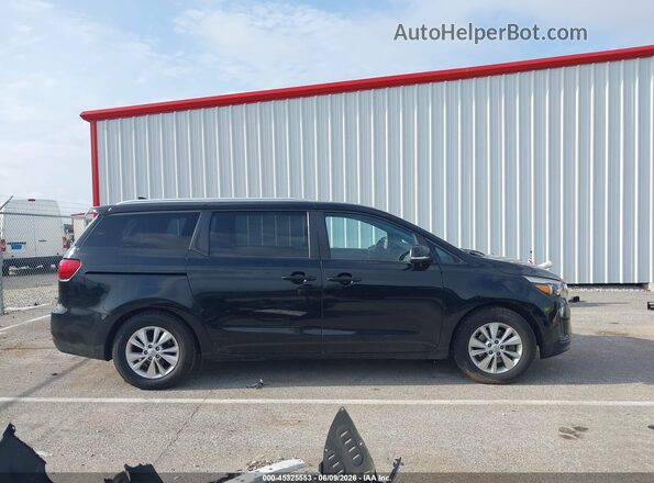 KNDMB5C18G6163273 2016 KIA SEDONA Black Rear interior view