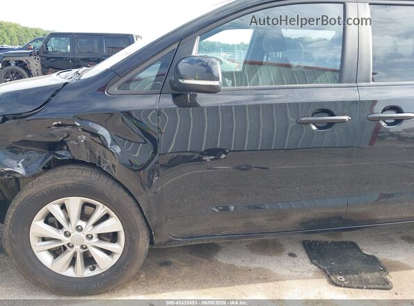 KNDMB5C18G6163273 2016 KIA SEDONA Black Front view