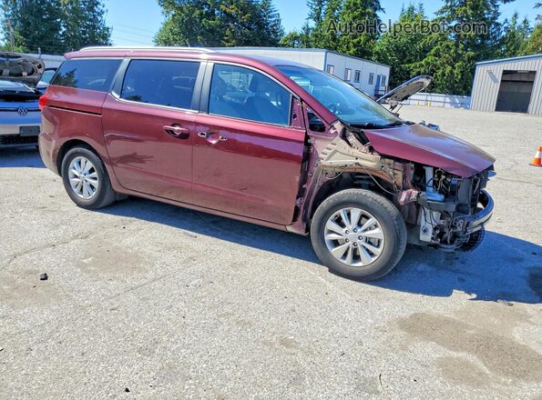 KNDMB5C18G6210026 2016 KIA SEDONA Maroon Front right