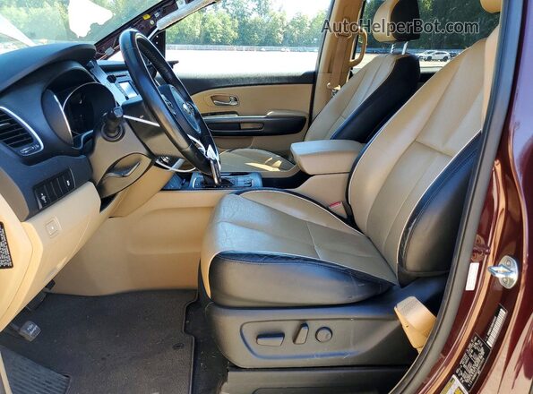 KNDMB5C18G6210026 2016 KIA SEDONA Maroon Front interior view