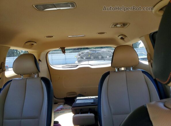 KNDMB5C18G6210026 2016 KIA SEDONA Maroon Rear seats view