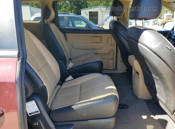 KNDMB5C18G6210026 2016 KIA SEDONA Maroon Rear interior view