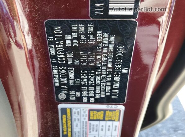 KNDMB5C18G6210026 2016 KIA SEDONA Maroon 360 interior view