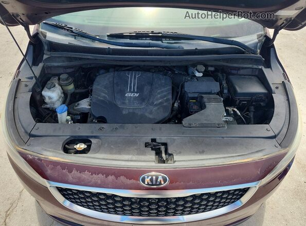 KNDMB5C18H6228432 2017 KIA SEDONA Maroon Engine compartment view