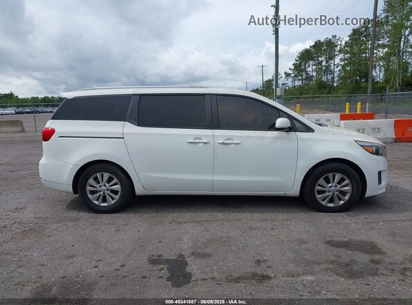 KNDMB5C18H6268106 2017 KIA SEDONA White Rear interior view