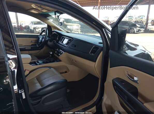 KNDMB5C18H6283186 2017 KIA SEDONA Black Front interior view