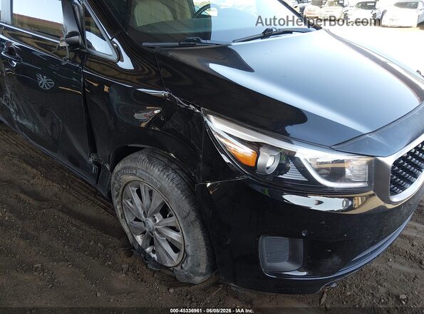 KNDMB5C18H6283186 2017 KIA SEDONA Black Front view