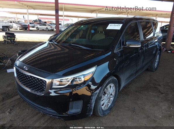 KNDMB5C18H6283186 2017 KIA SEDONA Black Front left