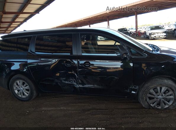 KNDMB5C18H6283186 2017 KIA SEDONA Black Rear interior view