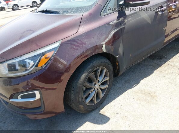 KNDMB5C19L6642313 2020 KIA SEDONA Maroon Vista interior trasera