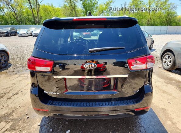 KNDMB5C1XJ6385952 2018 KIA SEDONA Black უკანა ხედი