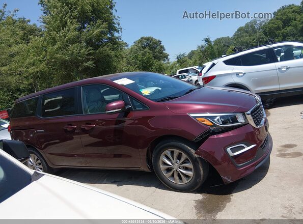 KNDMB5C1XK6548634 2019 KIA SEDONA Burgundy Rear interior view