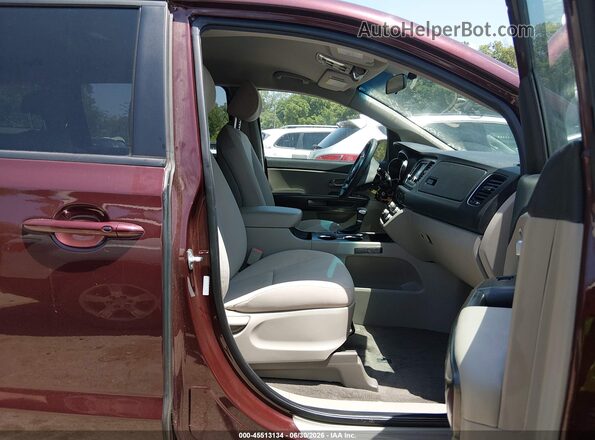 KNDMB5C1XK6548634 2019 KIA SEDONA Burgundy Front interior view