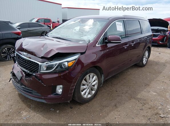 KNDMC5C12H6255641 2017 KIA SEDONA Burgundy Front left
