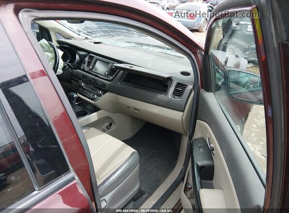 KNDMC5C12H6255641 2017 KIA SEDONA Burgundy Front interior view