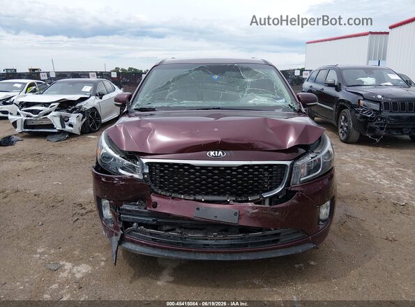 KNDMC5C12H6255641 2017 KIA SEDONA Burgundy Dashboard view